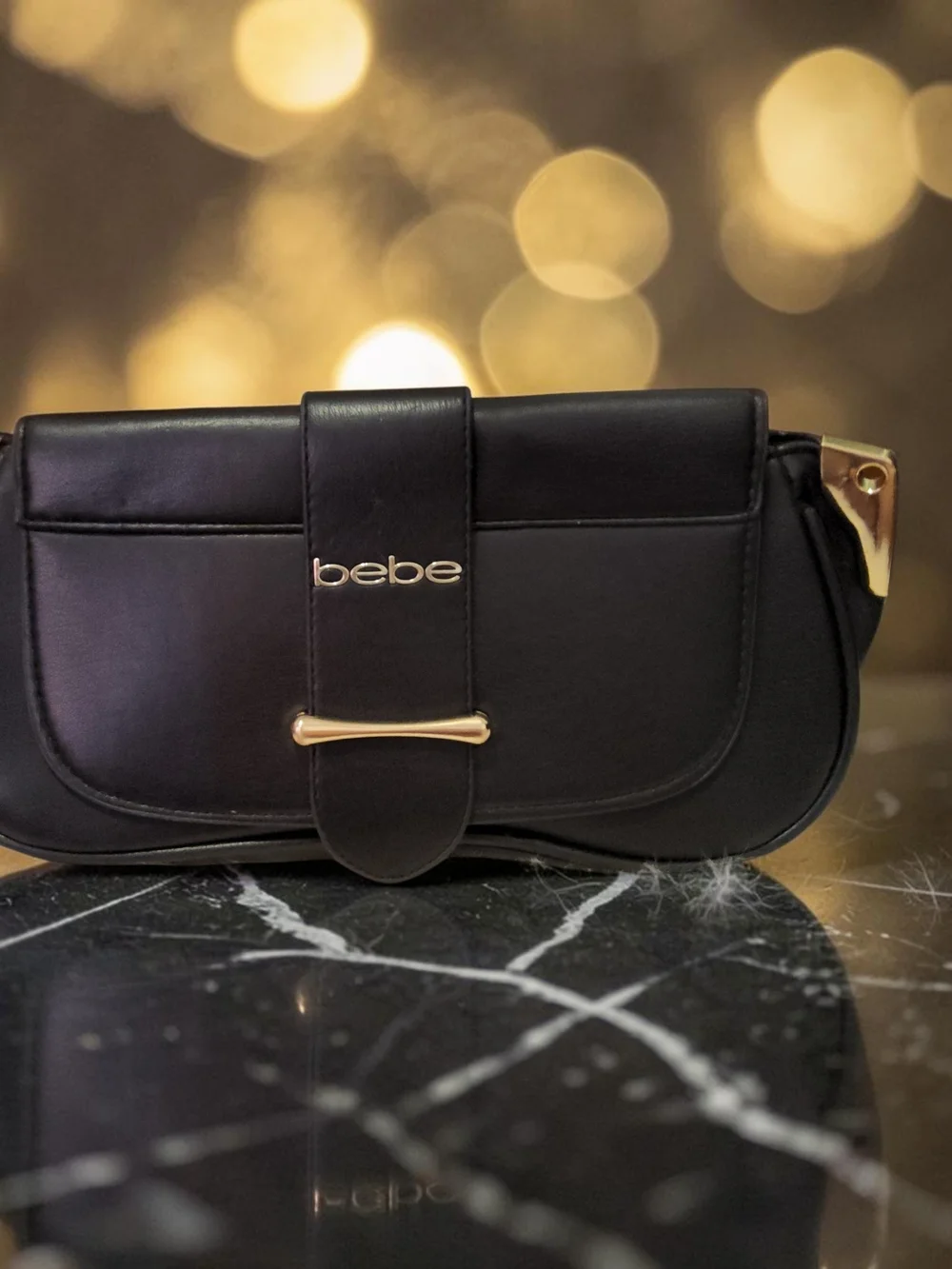 Bebe Black  Clutch with Gold Accents